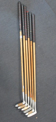 Lot 153 - Seven Otey Crisman hickory shafted putters of...