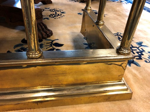 Lot 418 - A brass club fender, 20th century