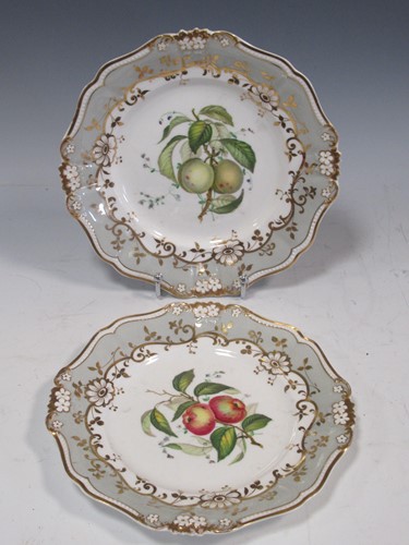 Lot 26 - A pair of plates decorated with fruit,...
