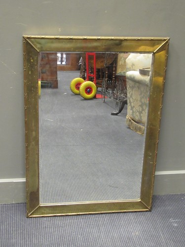 Lot 459 - A 20th century brass framed rectangular wall...