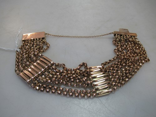 Lot 245 - an eight strand belcher style bracelet, tested...
