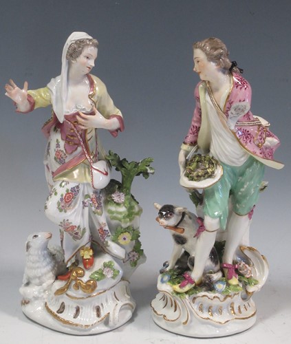 Lot 84 - A pair of Meissen figures of a boy and girl,...