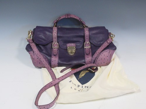 Lot 123 - Aspinal of London, a ladies purple leather...