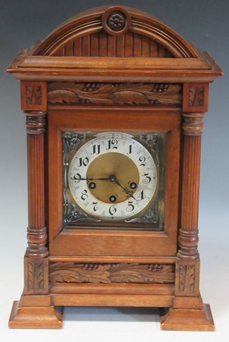Lot 150 - An early 20th century walnut case chiming...