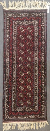 Lot 491 - A Beluchi rug, late 20th century, 225 x 100cm