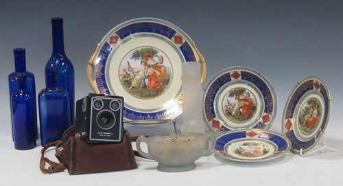 Lot 97 - An assortment of various blue glass bottles,...