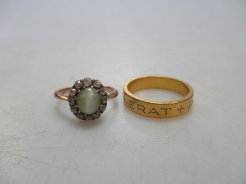 Lot 247 - A 'cats-eye' chrysoberyl and diamond cluster...