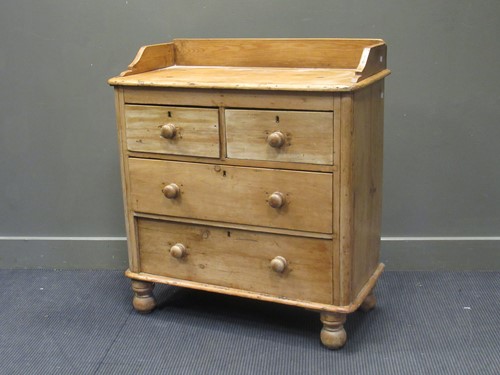 Lot 453 - A Victorian pine chest of drawers with gallery...