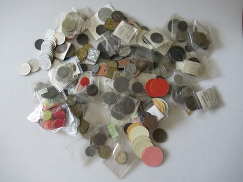 Lot 148 - A collection of assorted tokens, mostly 19th...