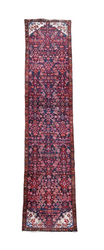 Lot 513 - A Malayer runner, with a repeating Herati...