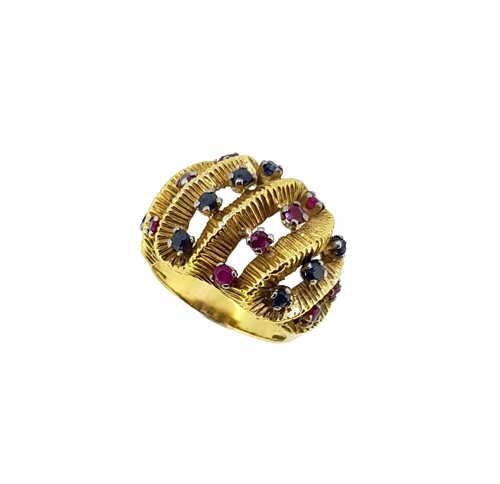 Lot 165 - A sapphire and ruby bombé style dress ring