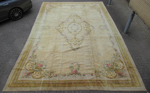Lot 508 - A large Aubusson style carpet, 604 x 394cm