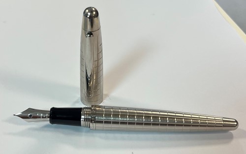 Lot 440 - Alfred Dunhill  - A steel cased fountain pen