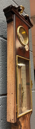 Lot 242 - A George III mahogany stick barometer by George Adams, London
