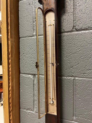 Lot 242 - A George III mahogany stick barometer by George Adams, London
