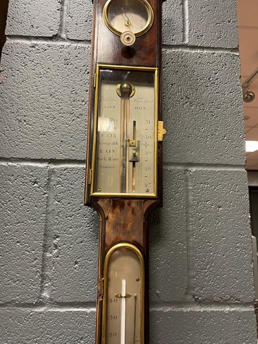 Lot 242 - A George III mahogany stick barometer by George Adams, London