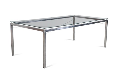 Lot 475 - A chrome and glass dining table by Artefacto of Sao Paulo, Brazil