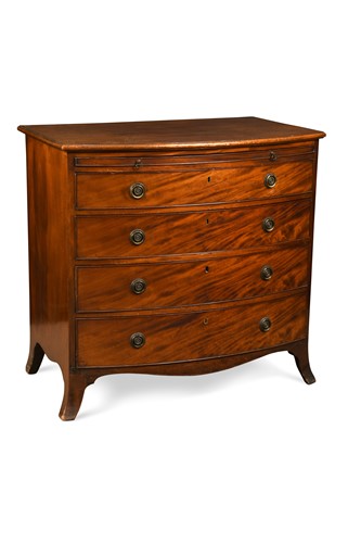 Lot 358 - A late George III mahogany bow front chest