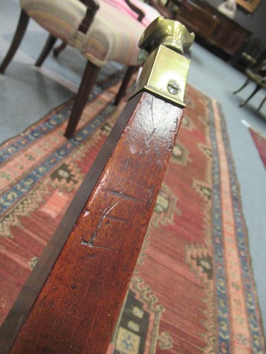 Lot 284 - A George III mahogany brass bound cellarette