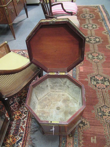 Lot 284 - A George III mahogany brass bound cellarette