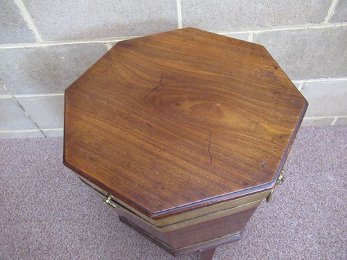 Lot 284 - A George III mahogany brass bound cellarette