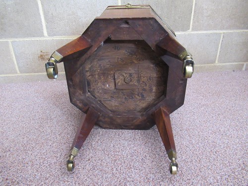 Lot 284 - A George III mahogany brass bound cellarette