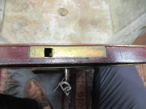 Lot 284 - A George III mahogany brass bound cellarette