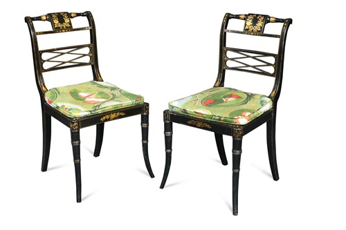 Lot 350 - A pair of late Regency ebonised and gilt side chairs