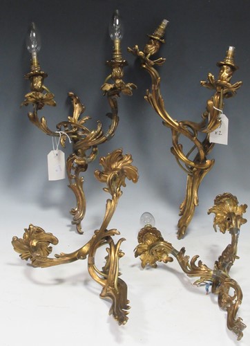 Lot 468 - Two pairs of 19th century gilt wall lights in...