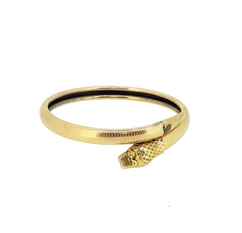 Lot 21 - A snake bangle