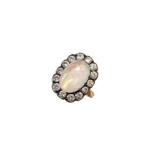 Lot 128 - An opal and diamond cluster ring