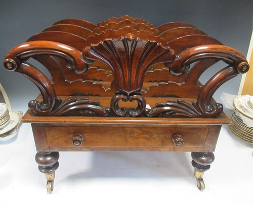 Lot 281 - A William IV walnut canterbury on turned legs...