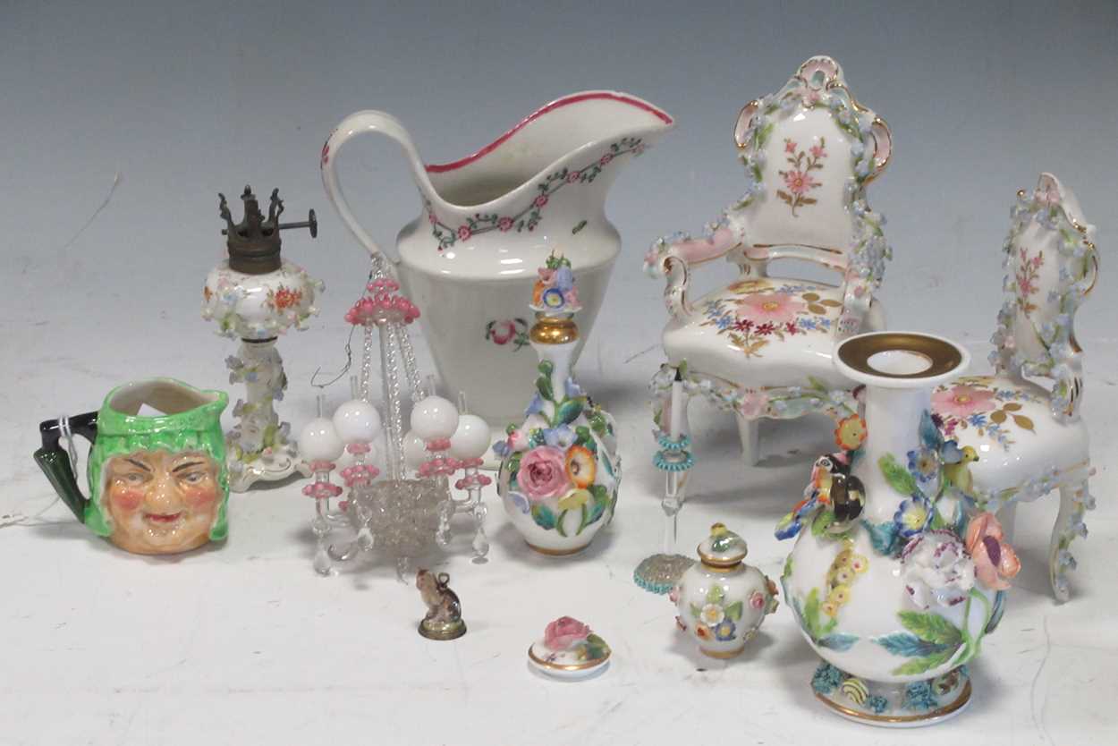 Lot 10 - A collection of miniature Continental vases,...