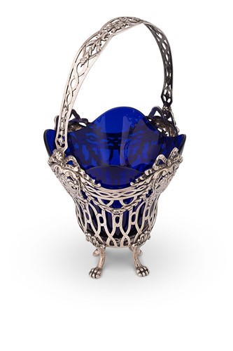 Lot 459 - A (probably) German metalwares silver swing handled sugar basket