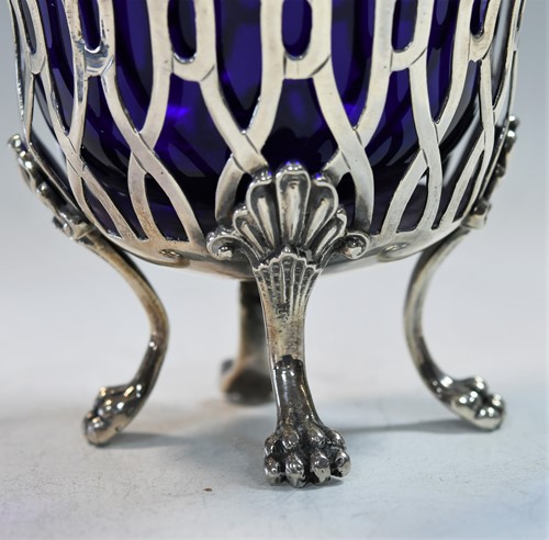 Lot 459 - A (probably) German metalwares silver swing handled sugar basket