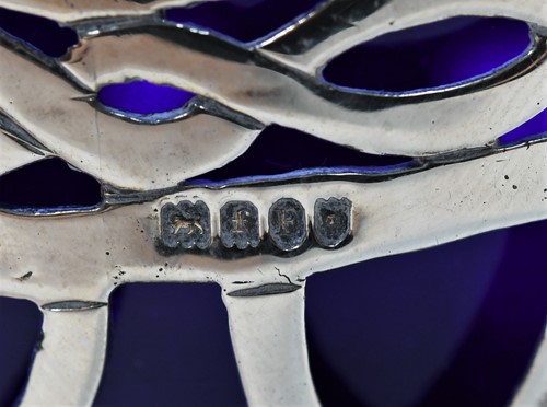 Lot 459 - A (probably) German metalwares silver swing handled sugar basket