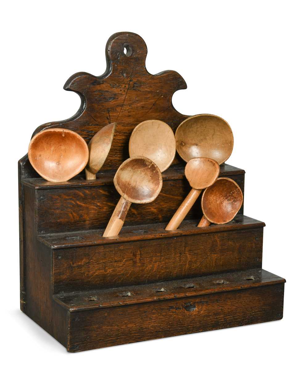 Lot 119 - An 18th century oak spoon rack,