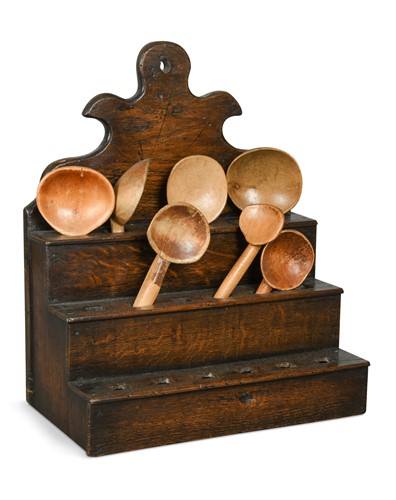 Lot 119 - An 18th century oak spoon rack