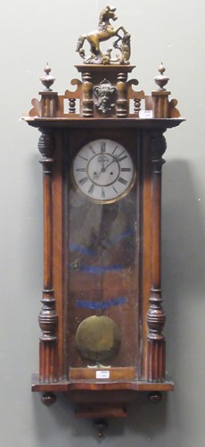 Lot 131 - A 19th century Vienna walnut wall clock