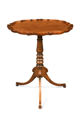 Lot 308 - A mahogany pie crust tripod table, 19th century