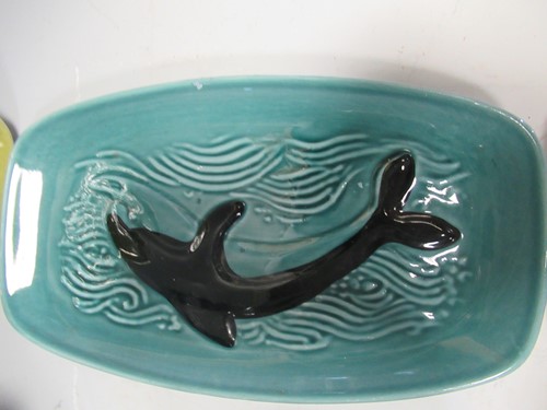 Lot 21 - A collection of Poole Ware to include four...