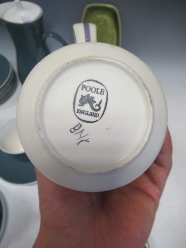 Lot 21 - A collection of Poole Ware to include four...