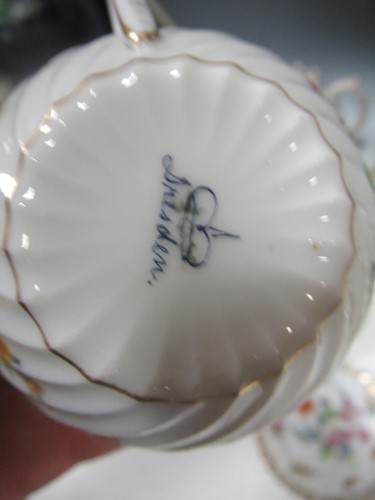 Lot 14 - Items of Dresden porcelain to include cups,...