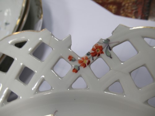 Lot 26 - Five Meissen plates with pierced borders and...