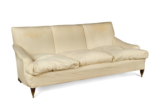 Lot 378 - A three seater sofa in the Howard style, 20th century