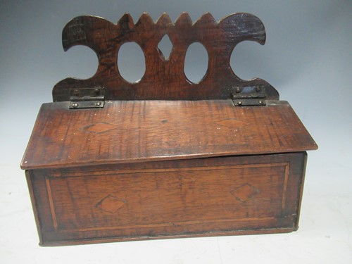 Lot 74 - A George III wall hanging salt box, 16cm high
