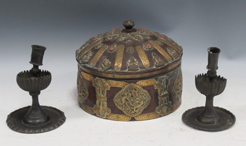 Lot 86 - A pair of Indian style candlesticks together...