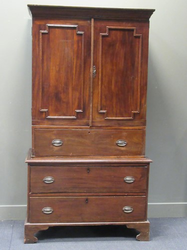 Lot 361 - A mahogany linen press, 20th century...