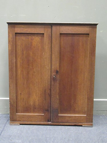 Lot 386 - An early 20th century oak two door cabinet, 81...