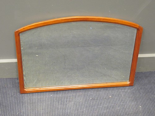 Lot 331 - A modern wooden framed wall mirror of arched...